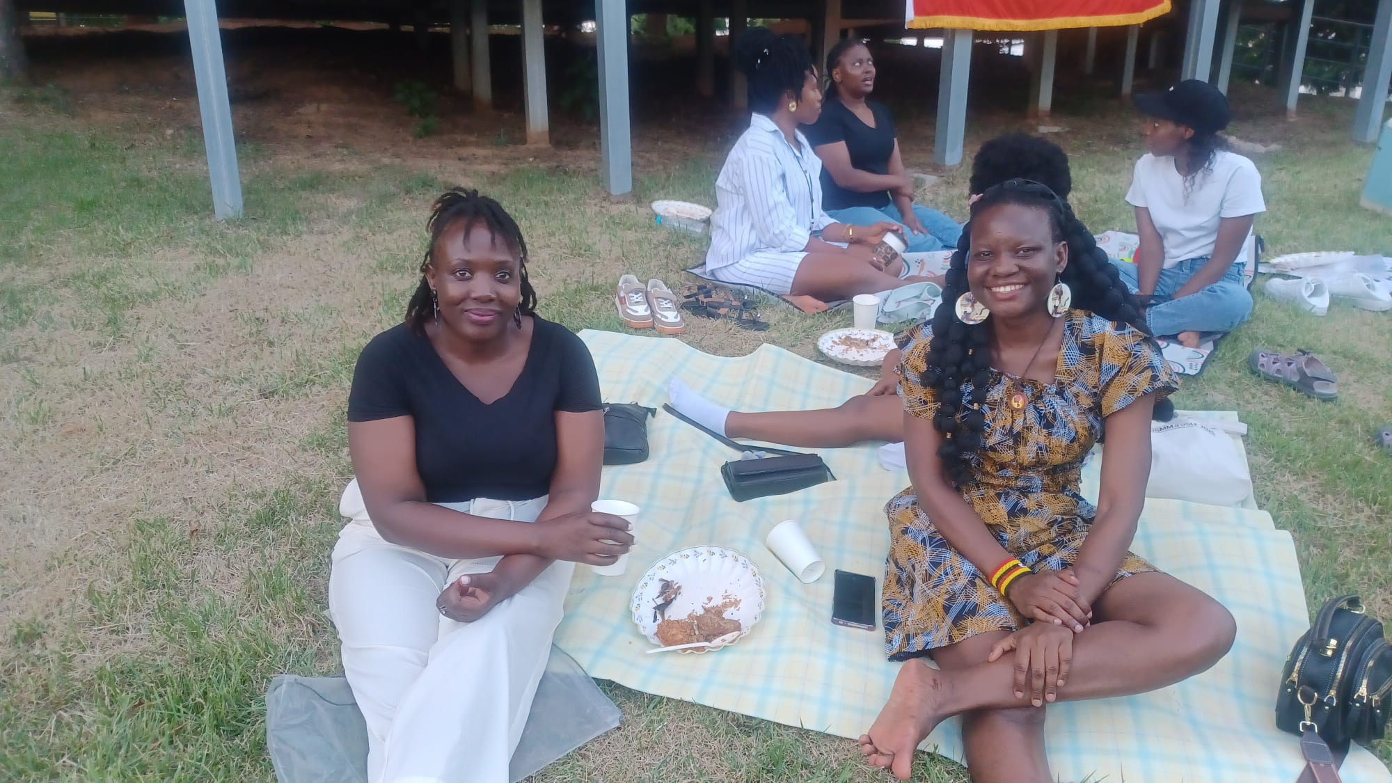 USKA members relaxing on a picnic blanket at Songtan park