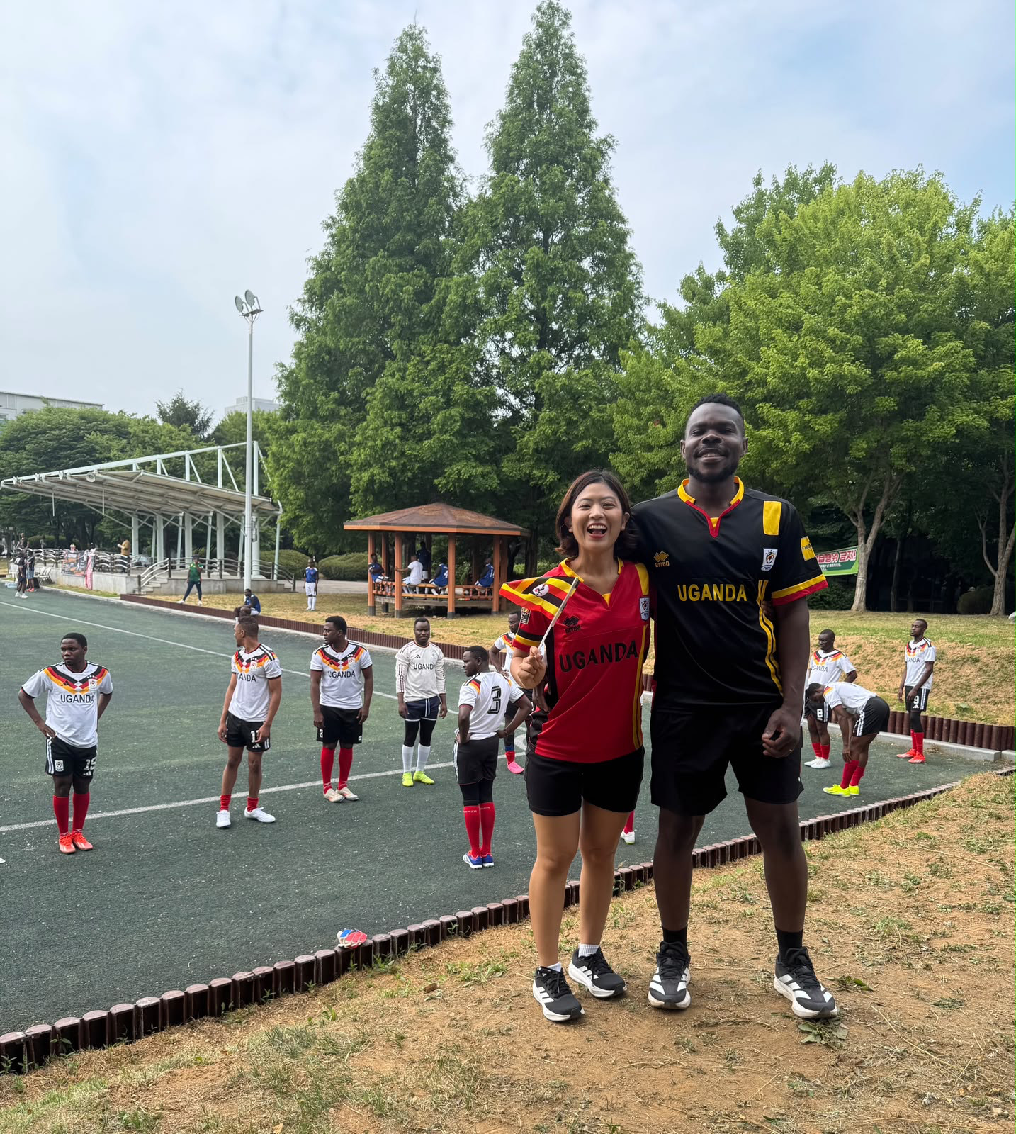 Team Uganda players and supporter at Mogok Neighborhood Park, Pyeongtaek — United Tournament 14 June 2026
